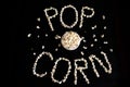 Popped Popcorn maize kernels and shaped in the word Ã¢â¬ËpopcornÃ¢â¬â¢